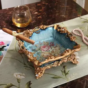 This European-style home decor set—featuring a vase predominantly in fresh blue tones, adorned with lifelike faux flowers—infuses your living space with a romantic ambiance. Paired with a matching tissue box and ashtray, it elevates the overall sophistica
