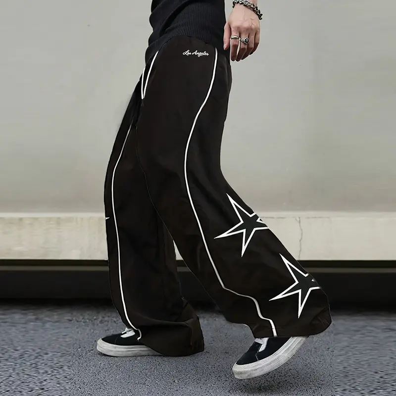 Single piece men’s casual long pants for spring/autumn with a slight flare; side white line decoration with five-pointed star print; embroidered small English lettering accessory; solid color wide-leg sports pants suitable for holiday streetwear, shopping
