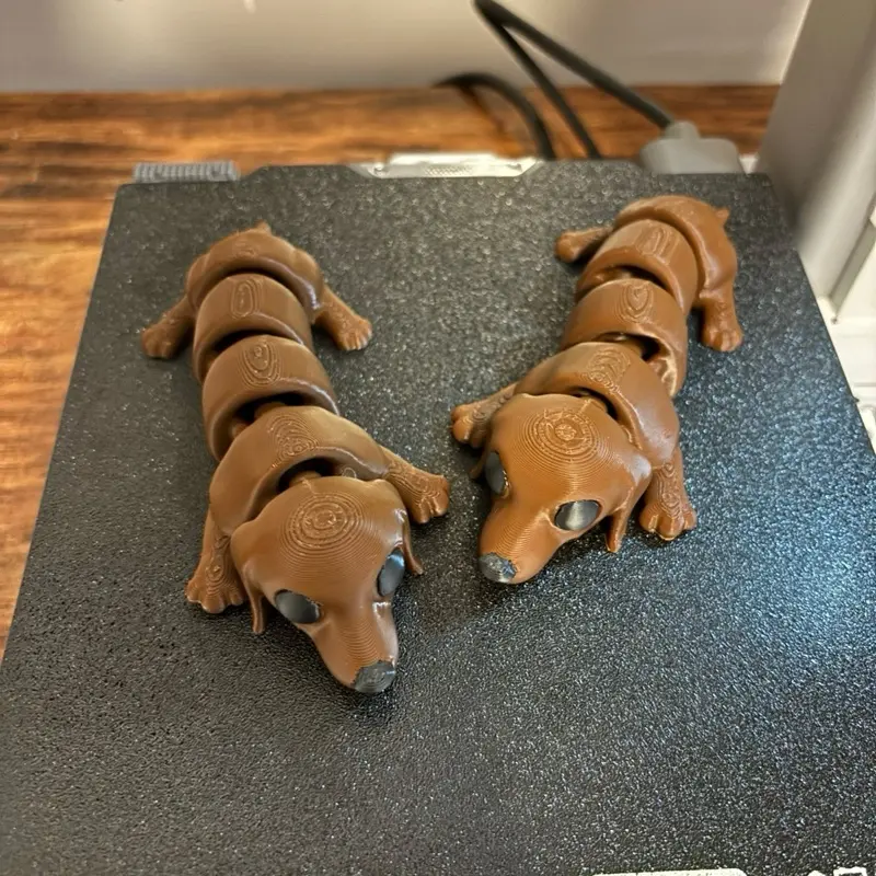 3D Printed Articulated Dachshund Wiggly Sausage Dog Figurine for Collectors and Enthusiasts Unique Fantasy Decor