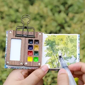 Mini Travel Watercolor Palette Pocket Set-This includes an 8-unit portable wooden palette, a 12-color paint box, a portable outdoor sketch palette, a wooden grid box, and a home mini brush.