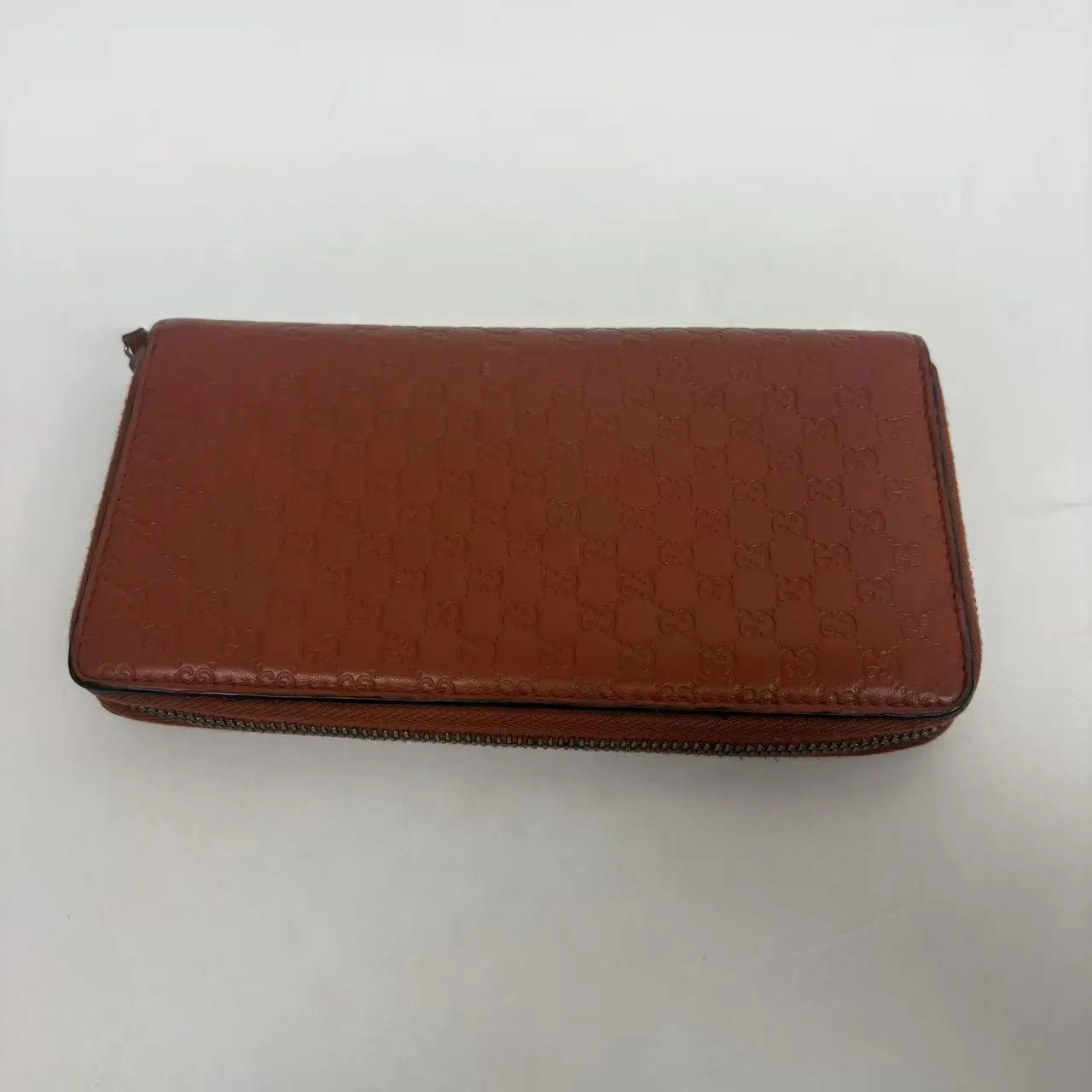 Pre-owned Calfskin Small Leather Goods Gucci Embossed GG Zippy Wallet