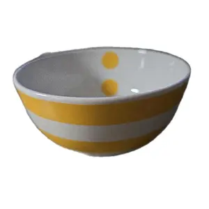 Cute Tableware of Yellow and White Striped Small Bowls With Yellow Dots on the Inside of the Bowls.  Made by IKEA.