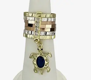 Anillos semanarios tortuga oro laminado talla 7