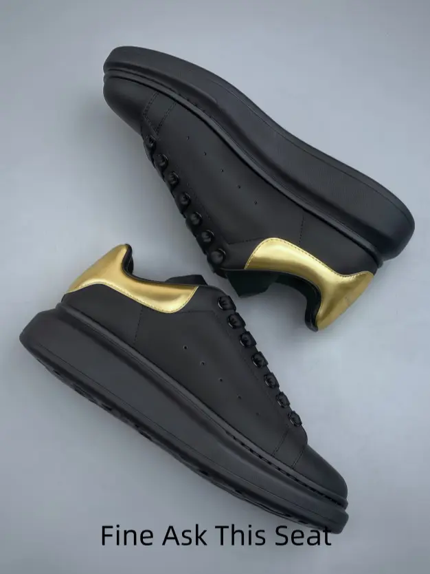 All Black Platform Sneakers Shiny Metallic Gold Heel Tab Smooth Matte Leather Upper Thick Black Height Boost Sole Black Laces Lace Up Luxury Unisex Street Casual Shoes