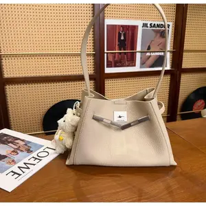 Autumn and winter women's bag in solid color with lychee pattern, lock clasp and drawstring, hand-held bucket bag, 2026 new model, soft surface, single shoulder crossbody bag, simple KL tote bag, minimalist style, versatile with double shoulder straps