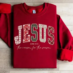 A trendy Christian Jesus sweatshirt with a Christmas Bible verse and a Jesus Loves You crewneck, making a meaningful faith-based gift for the Reason for the Season.