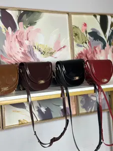 Dalcy Women's Handbag - Dark Brown Leather Style with Gold Accent Closure