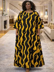 African Black and Gold Ankara Maxi Dress – Elegant Flowing Statement Dress with Bold Wave Print