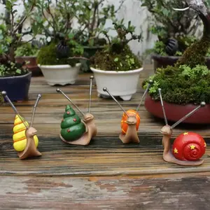 Set of 4 Mini Snail Sculptures, Resin Garden Decorations, Outdoor Patio Art, Lawn Ornaments, Perfect for Christmas & Halloween