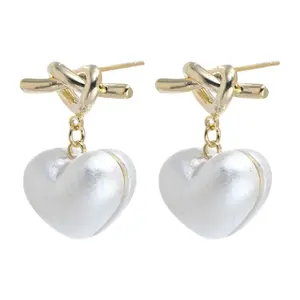 Heart-Shaped Gold Earrings with Bow Detail
