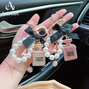 Women's Rhinestone-Embedded Alloy Bow Keychain | Pearl Chain Perfume Bottle Purse Pendant | Fashion Accessory