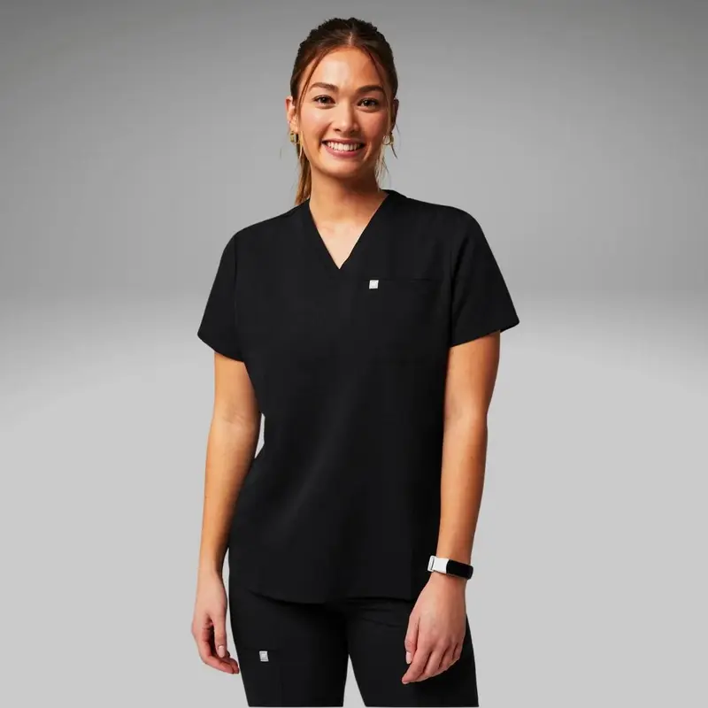Fabletics Women's Vital 1-Pocket Scrub Top Clothing