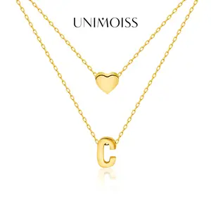 UniMoiss Titanium Steel Heart Letter Double Layer Pendant Necklace Golden Finish Elegant Layered Chains Adjustable Fit Perfect for Birthday Anniversary Gifts Tarnish Proof Jewelry Handmade Fashion Accessory