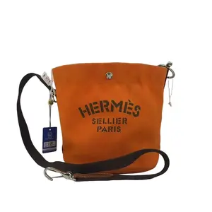 Pre-owned HERMÈS france Crossbody Bags Hermes orange bucket crossbody bag