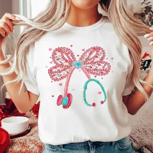 Pink Coquette Valentine Nurse T Shirt Cute Stethoscope Bow Floral Graphic Tee Aesthetic Nursing Love Shirt Unisex Soft Cotton Top Valentine Gift for Nurses Healthcare Worker Appreciation Shirt
