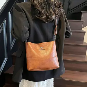 Comfortable Bucket Crossbody Bag - Adjustable Strap Lightweight Shoulder Purse with Spacious Storage ﻿