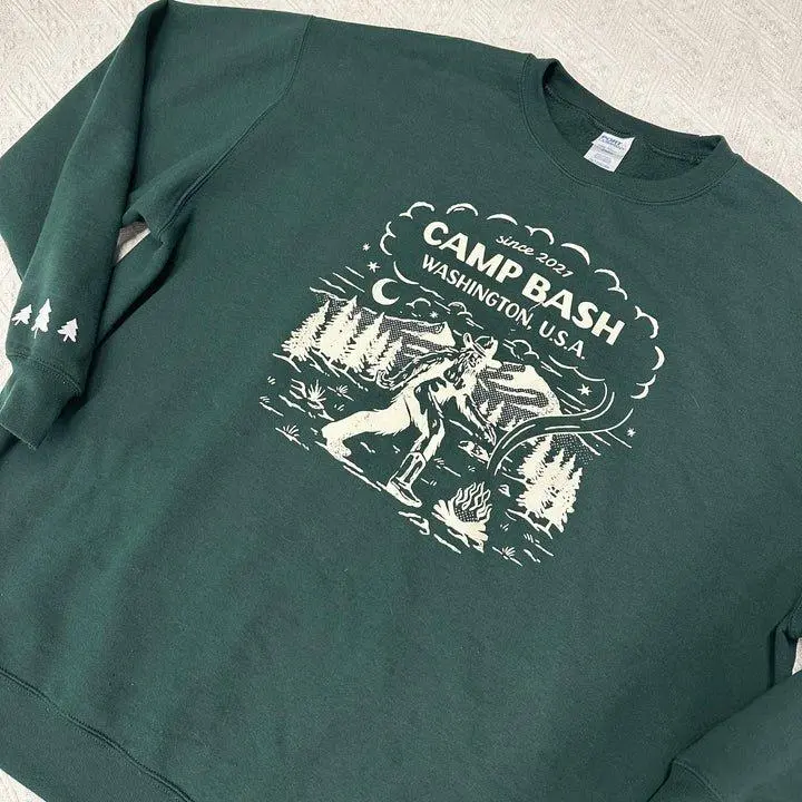 Port & Company Camp BASH Bigfoot Evergreen Crewneck Sweatshirt – PNW Sasquatch Camping Graphic All Seasons Unisex Fit Soft Fleece