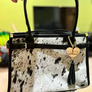 Cowhide Handbag with Heart Charm and Tassel Detailing