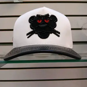 PANTHER WHITE VINIL BRIM WITH CRYSTALS HAT     100% ORIGINAL AND GUARANTEED QUALITY J/A