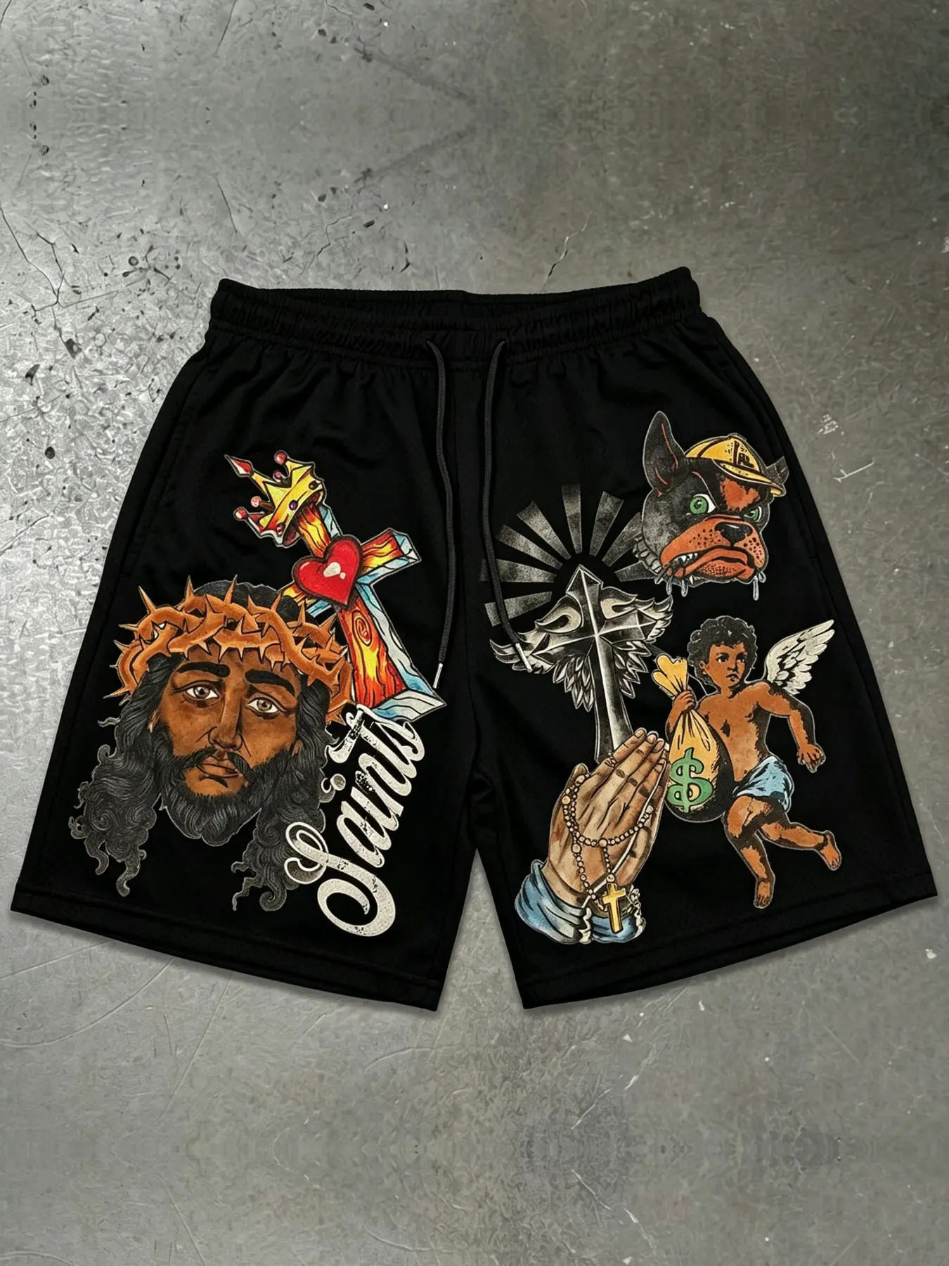 1 PCS Black Mesh Shorts, "Saints" Jesus Cross Tattoo-Style Graphic Print, Retro Faith-Inspired Streetwear, Breathable Drawstring Athletic Shorts, Ideal for Gym, Casual Wear & Urban Fashion Fans