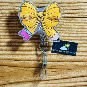 Pencil Bow Badge Reel