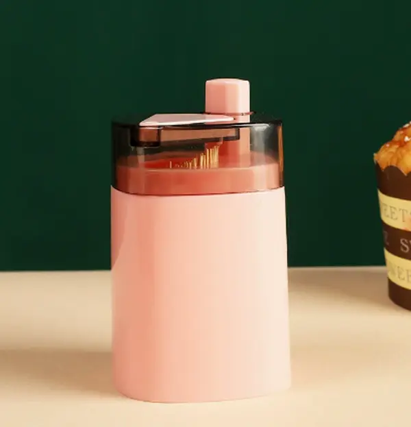 One-Press Automatic Toothpick Dispenser With A Sleek Blue Body And Bright Yellow Button — Keeps Your Table Tidy And Hygienic While Adding A Pop Of Color To Your Dining Setup
