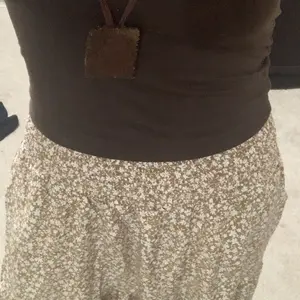 Women's Casual Ruffled Hem A-Line Skirt, Elastic Waist Pockets Long Skirt, Fashionable Shirred Skirt