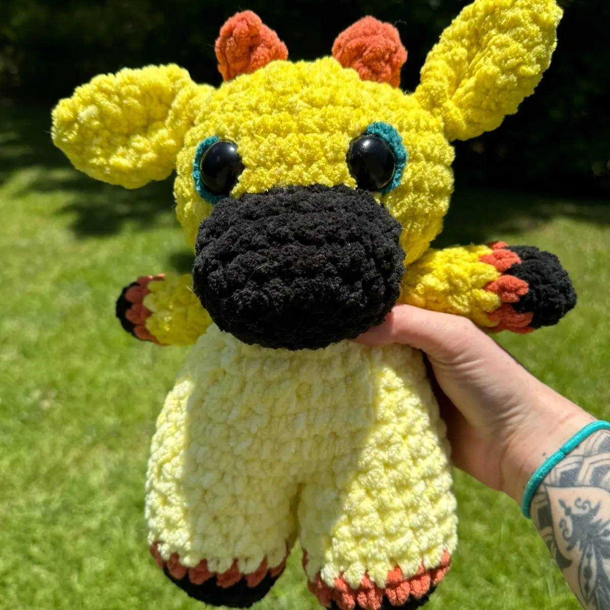 Crochet sunflower cow plushie