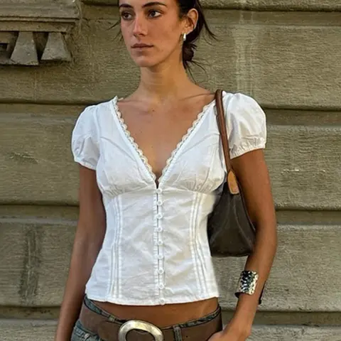 Street Style Casual Solid Fitted Deep V-Neck Lace Trim Puff Sleeve T-Shirt Blouse. Minimalist Basic Versatile Button Cut-Out Shirt. Niche Hot Girl Sexy Summer Short Sleeve Top. Blouses Shirts Tops