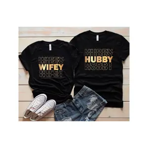 100% Cotton Matching Couple Black Round Neck Short Sleeve T-Shirts Soft Comfortable Fabric Trendy "Wifey & Hubby" Design Casual Fashion Style Ideal for Daily Wear Perfect for Engagements Anniversaries Great Gift for Couples Family Friends