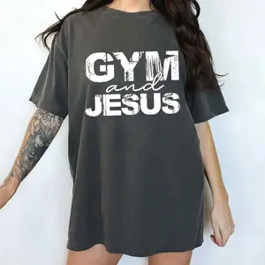 Vintage Washed Oversized Graphic Tee, Gym And Jesus Christian Workout T-Shirt, Retro Faith Based Fitness Short Sleeve Top for Women, Trendy Religious Statement Shirt, Comfort Colors Style Apparel, Perfect Gift for Fitness & Faith Lovers, Daily Outfit