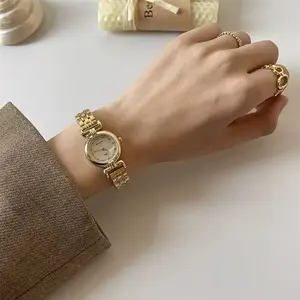 Luxury Watch - Elegant Gold-Tone Stainless Steel Band with Classic White Dial for Women
