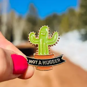 “Not a Hugger” Pin