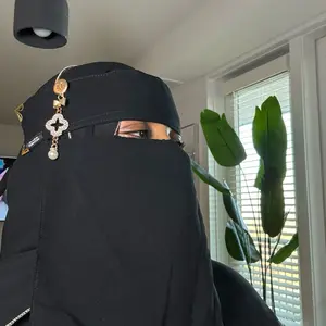 Niqab with a Beautiful Gold Ring - Elegant Black Cover for Women's Modesty