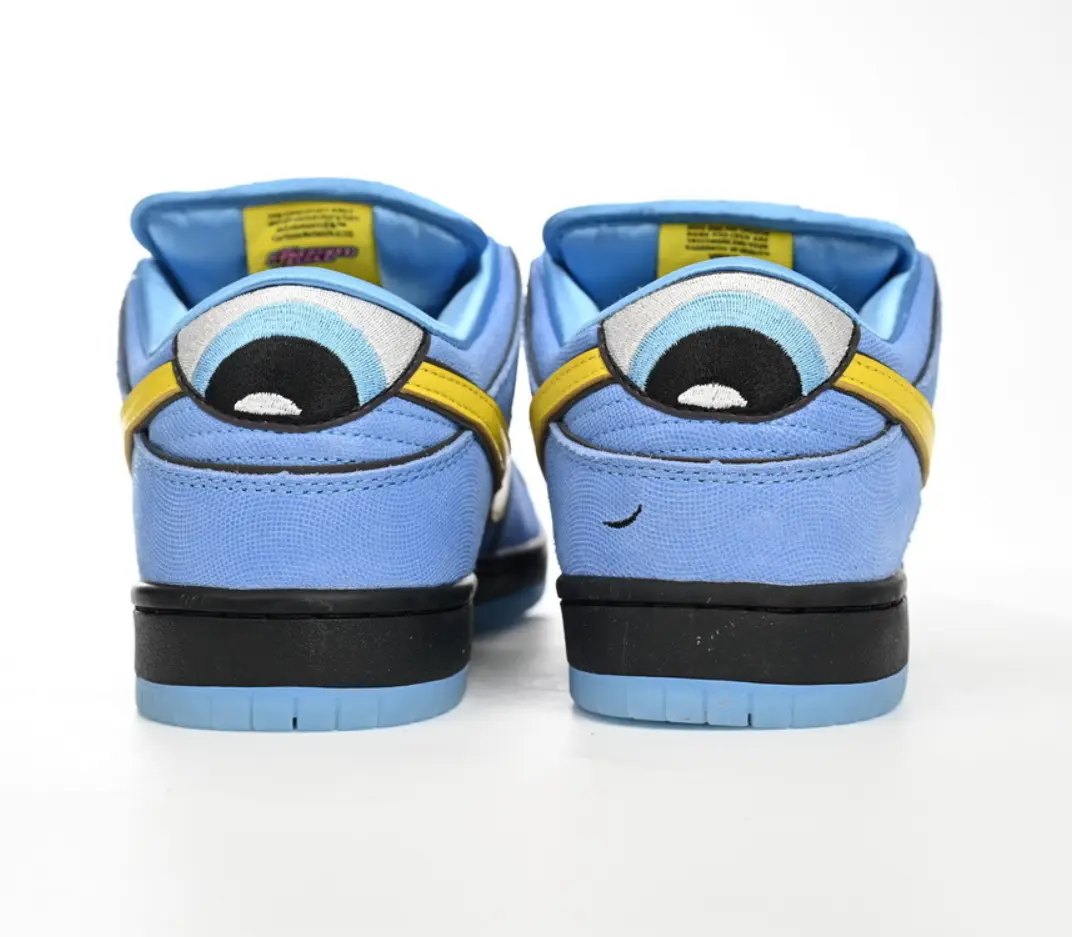 UNC Blue Low Top Sneakers, Light Blue Upper, Yellow Swoosh Detail, Black Outsole, Classic Dunk Style Casual Street Shoes