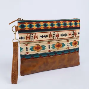 Clutches - Brown Wristlet with Geometric Patterns and Zip Closure