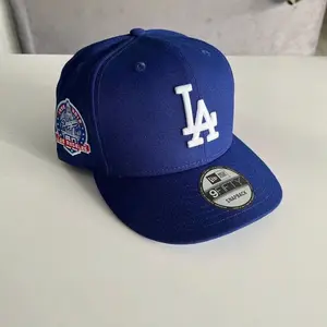 New Era MLB Los Angeles Dodgers Street Fashion Cap – 59FIFTY Fitted Snapback Baseball Hat, 9FORTY Adjustable Fit, Unisex Urban Streetwear Look, Trending TikTok USA 2026