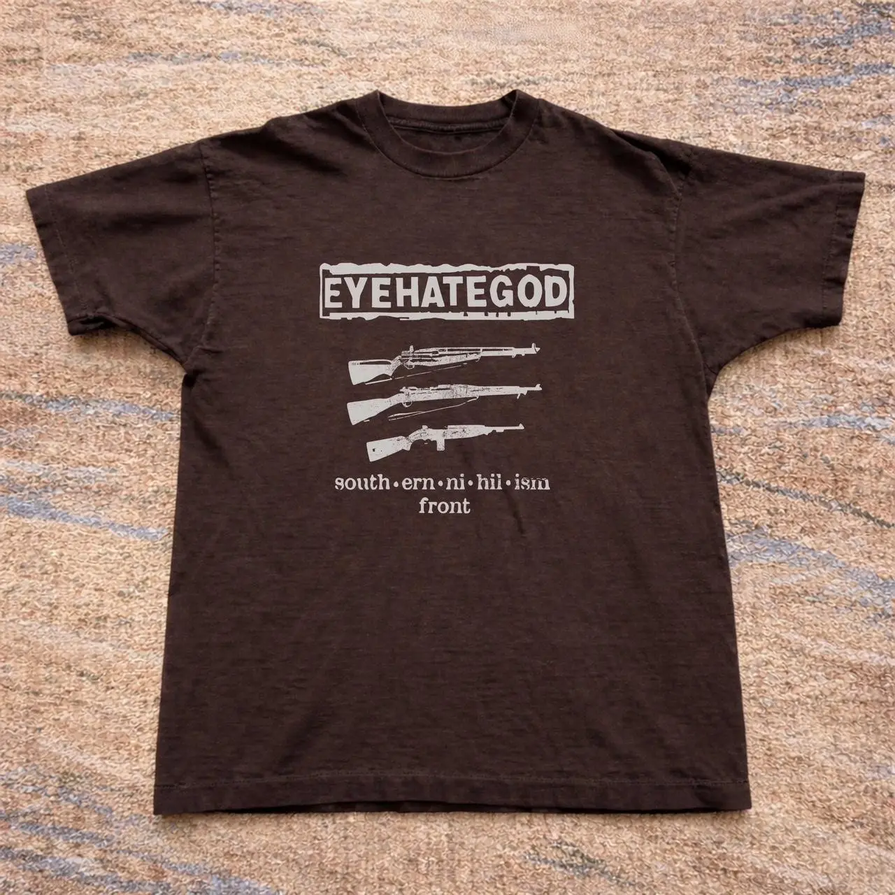 Brown and white Eyehategod band tee
