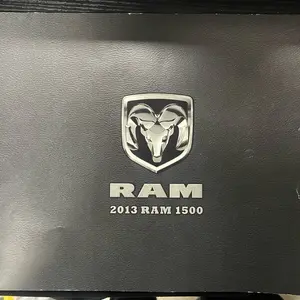 RAM 2013 RAM 1500 Black Sales Brochure Booklet with Genuine Logo Silver Embossed Lettering and Emblem Sleek Textured Surface