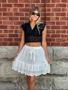 White Tiered Ruffle Mini Skirt - Stylish Design with Ruffle Detail and Tiered Style for Versatile Wear Lace Womenswear