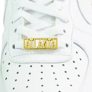 Atlanta Metal Dubraes custom shoelace tags for all shoes provided by Dubraes