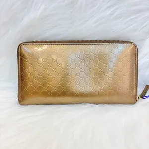 Pre-owned GUCCI Metallic Micro GG Embossed Leather Zip Around Long Wallet Preowned