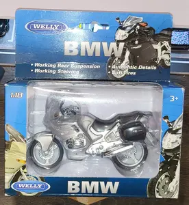 Welly 1:18 scale diecast model of a BMW R1100 RT motorcycle in silver.
