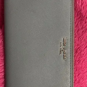 Kate Spade New York Gray Wallet with Pink Fur Trim and Logo Embroidery