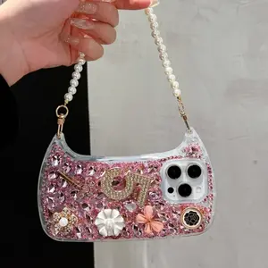 Phone case with a wrist strap and a pearl chain for cross - body wearing, suitable for Apple iPhone 17