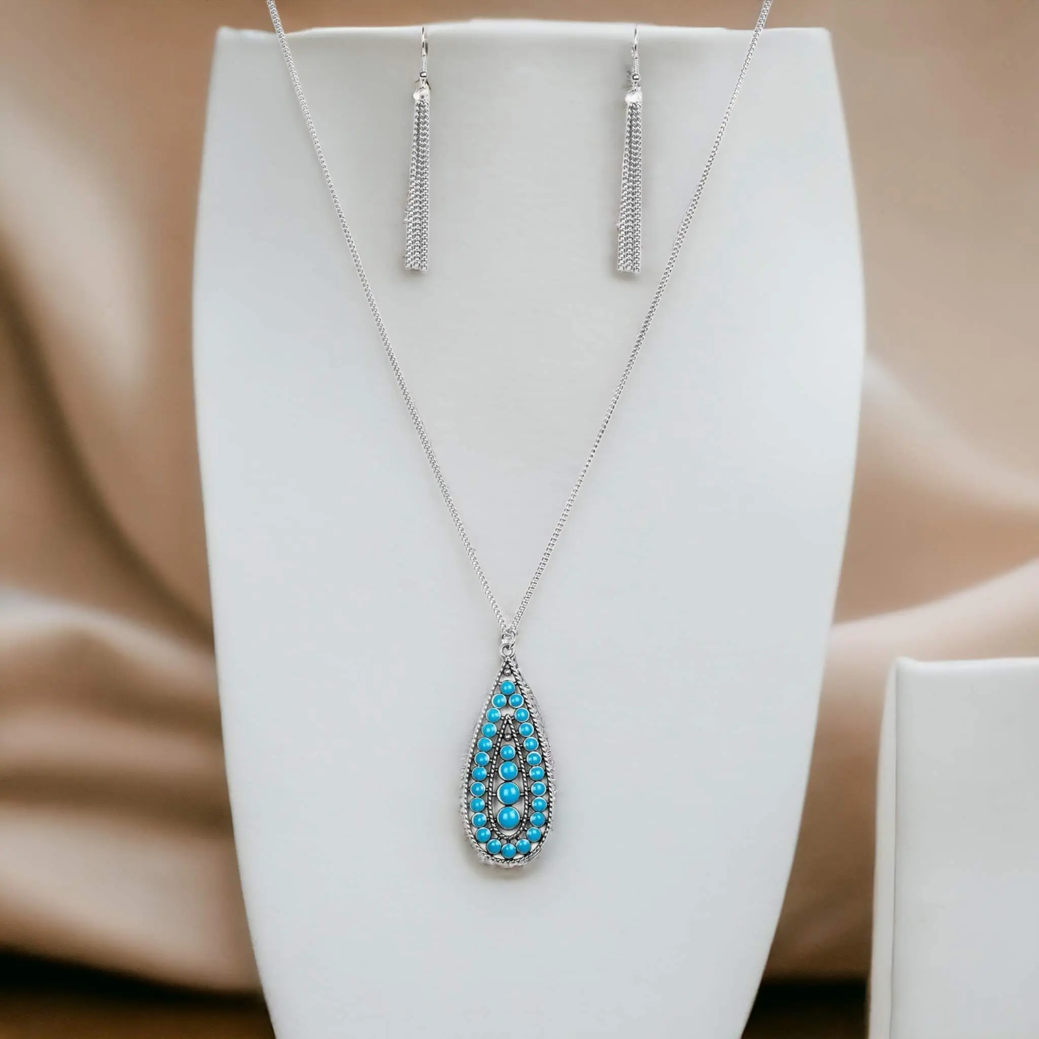 Tiki Tease Blue Necklace with Decorative Pendant and Simple Chain