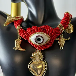 Red Artisanal Thread Collar with Crystal Eye & Gold-Toned Cowboy Charms Elegant Unique Design for Versatile Wear