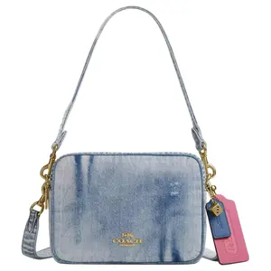 COACH Carey 15 Mini Shoulder Bag in Light Indigo Denim with Gold Lettering for Women