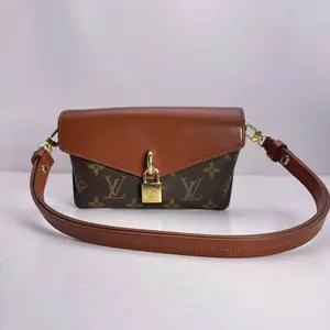 Pre-owned Louis Vuitton france Clutches & Wristlets LV Lock Underarm Bag Monogram and Brown Clutches Wristlets with Gold Hardware and Adjustable Strap (SZ H60968)