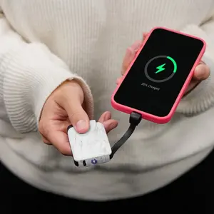 This is the StayPlugged Emergency Keychain Power Bank — a compact charger designed for on-the-go and emergency use.